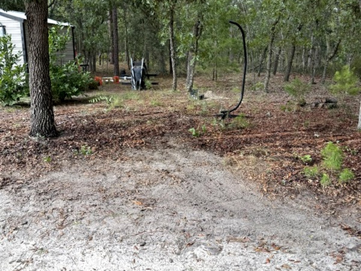 Same property cleared of demolition debris by Backroad Hauling