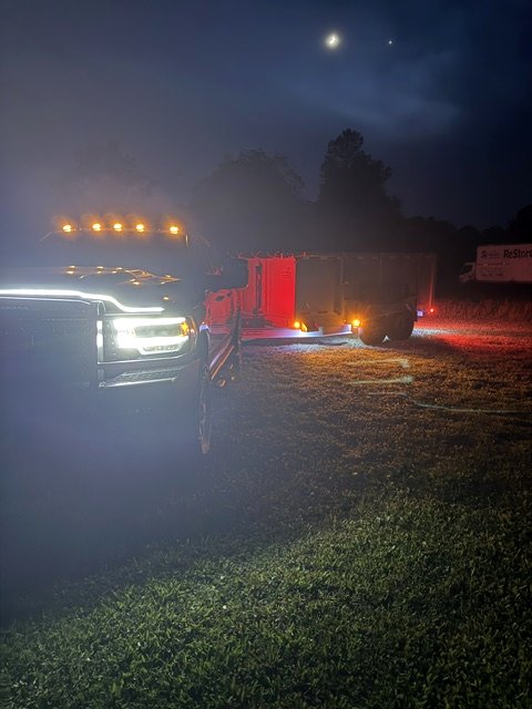 Backroad Hauling truck and trailer working at night