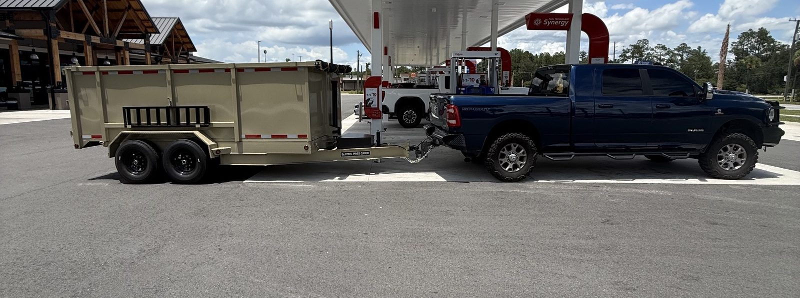 Backroad Hauling's Ram 2500 and 14-foot hydraulic dump trailer